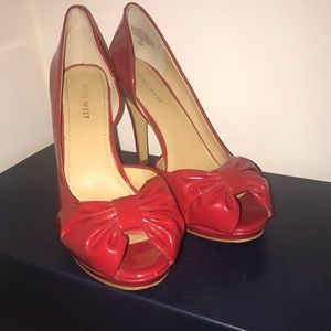 Red Peep toe pumps